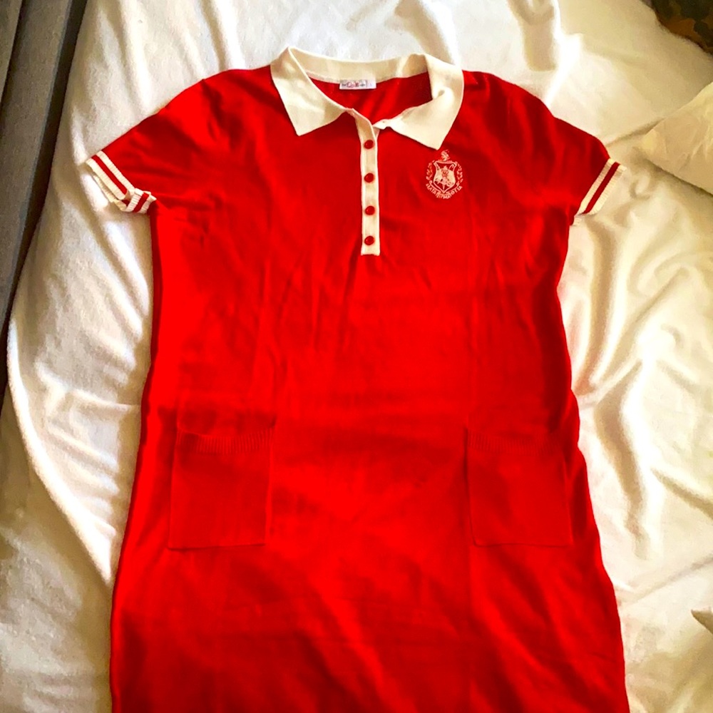Delta Box limited edition dress with crest